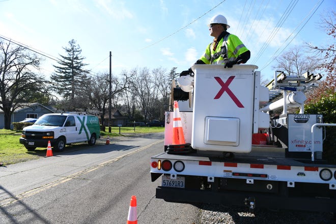 Comcast technicians working around Sacramento CA neighborhoods on Tuesday, January 30, 2024. Comcast is currently expanding internet services in Griswold and Sterling.  This expansion will be completed by the end of the year.